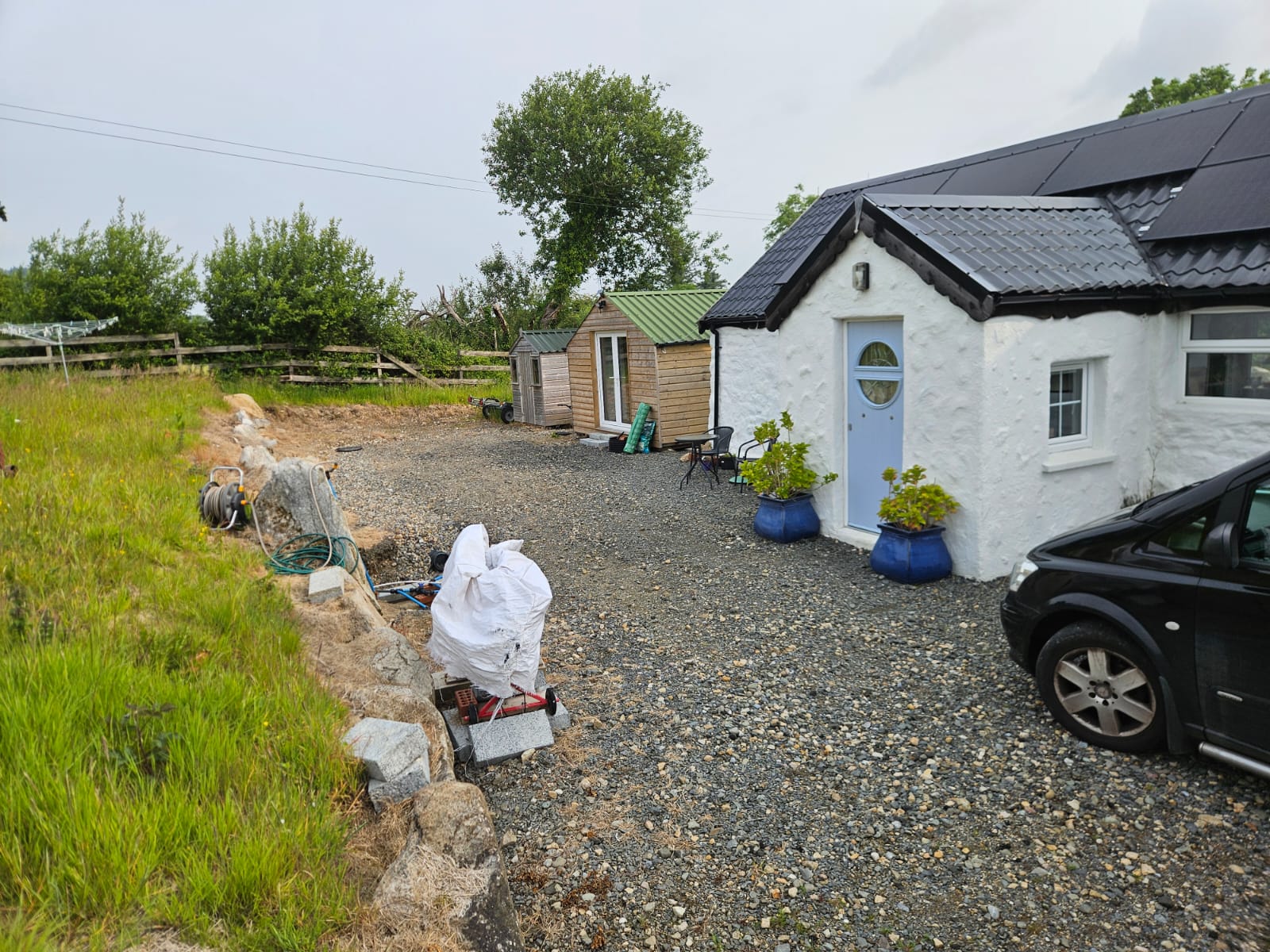 Before photo showing limited gravel driveway access